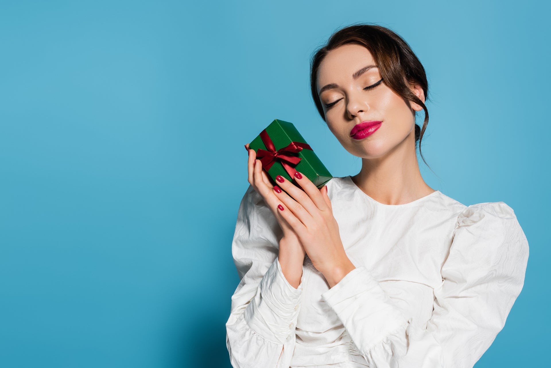 Woman with holiday gift box