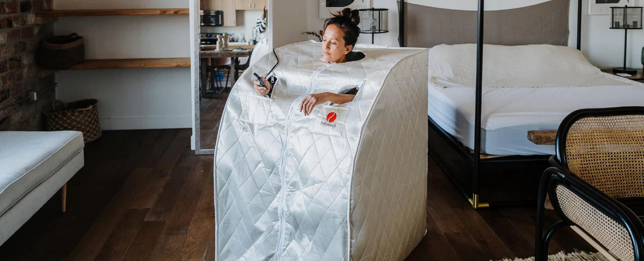 Woman enjoying the comfort and privacy of a portable personal infrared sauna.